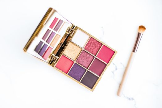 Cosmetic branding, fashion blog and glamour set concept - Eye shadow palette swatches on marble background, make-up and eyeshadows cosmetics product for luxury beauty brand and holiday flatlay design