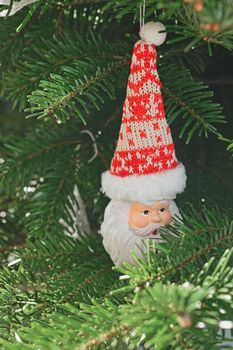 Ceramic Christmas toy Santa Claus hanging on the Christmas tree