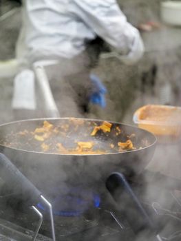 preparing autumn mushroom sauce for tagliatelle pasta- italian food