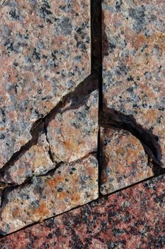 Abstract background of damaged stone floor with cracks.