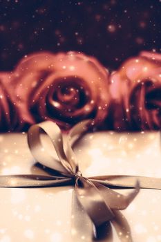 Vintage design, shop sale promotion and happy surprise concept - Luxury holiday golden gift box and bouquet of roses as Christmas, Valentines Day or birthday present