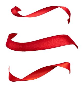 close up of a red ribbon bow on white background