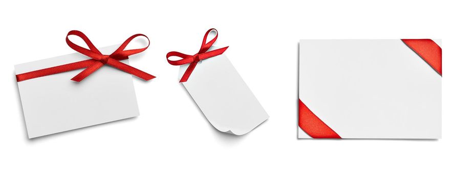 close up of a note card with ribbon bow on white background