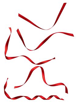 close up of a red ribbon bow on white background