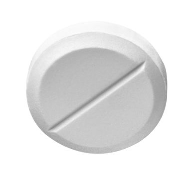 close up of a white pill on white background