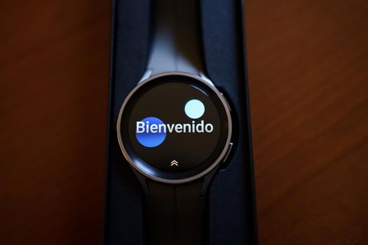 Granada, Andalusia, Spain - September 28th, 2022: New Samsung Watch 5 Pro in its box. Welcome screen.