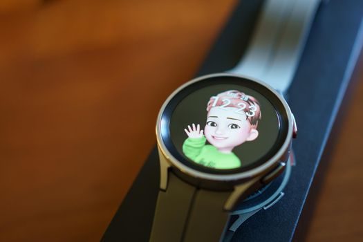 Granada, Andalusia, Spain - September 28th, 2022: New Samsung Watch 5 Pro with watch face of AR Emoji