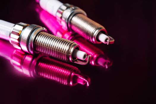 Spark plugs for internal combustion engines in defocus. Selective focus