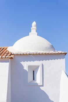 White ancient chapel building Saint Bartolomeu. Sines, Portugal