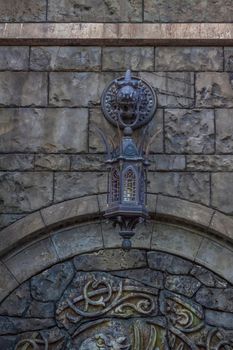 Antiquity in detail. Decoration of houses, balconies, windows, sculptures, walls. Elements of architectural design of buildings. Old plaster, Stone decorations. Elements of Gothic architecture.