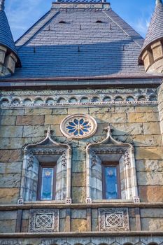 Antiquity in detail. Decoration of houses, balconies, windows, sculptures, walls. Elements of architectural design of buildings. Old plaster, Stone decorations. Elements of Gothic architecture.