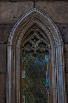 Antiquity in detail. Decoration of houses, balconies, windows, sculptures, walls. Elements of architectural design of buildings. Old plaster, Stone decorations. Elements of Gothic architecture.