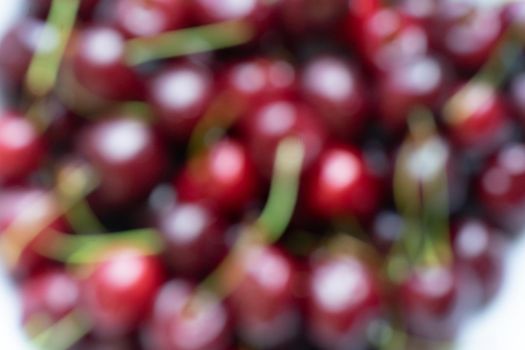 Blurred photo of cherries and cherries. High quality photo