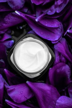 Cosmetic branding, moisturizing and anti-age - Luxury face cream moisturizer for facial skin on purple flower background, floral essense, spa cosmetics and beauty emulsion for skincare brand product