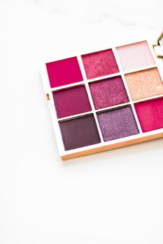 Cosmetic branding, fashion blog and glamour set concept - Eye shadow palette swatches on marble background, make-up and eyeshadows cosmetics product for luxury beauty brand and holiday flatlay design