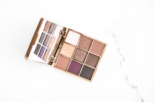 Cosmetic branding, fashion blog and glamour set concept - Eye shadow palette swatches on marble background, make-up and eyeshadows cosmetics product for luxury beauty brand and holiday flatlay design