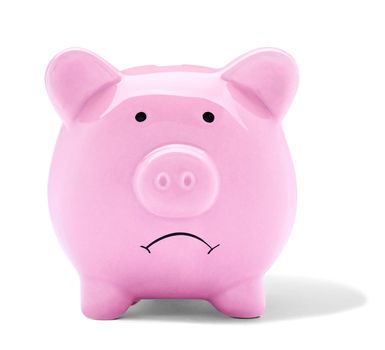 Close up of a sad pink piggy bank on white background