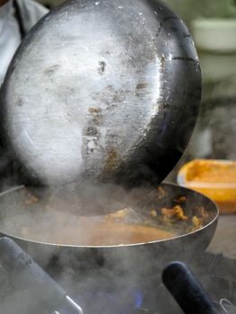 preparing autumn mushroom sauce for tagliatelle pasta- italian food