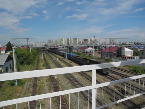 Freight wagons at the station, freight wagons on the railway tracks.