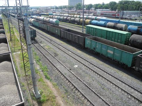 Freight wagons at the station, freight wagons on the railway tracks.