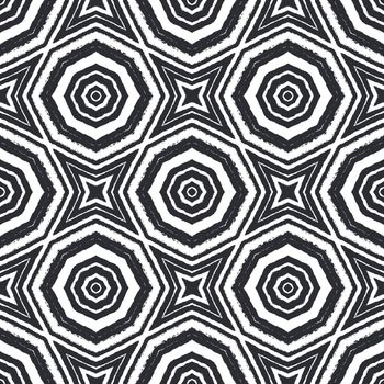 Arabesque hand drawn pattern. Black symmetrical kaleidoscope background. Textile ready extraordinary print, swimwear fabric, wallpaper, wrapping. Oriental arabesque hand drawn design.