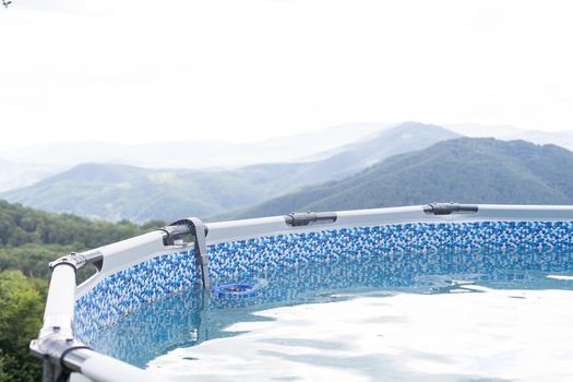 landscape view of swimming pool and top of mountain view and nature.