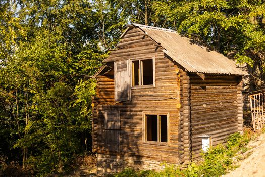 old wooden house in spring Carpathian mountains in Ukraine.