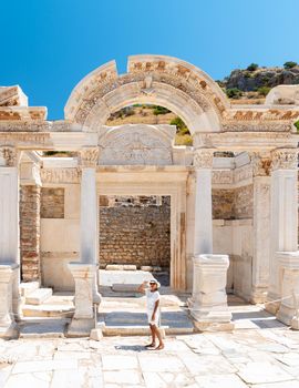 Ephesus ruins, Turkey, beautiful sunny day between the ruins of Ephesus Turkey. Asian women with a hat visit Ephesus