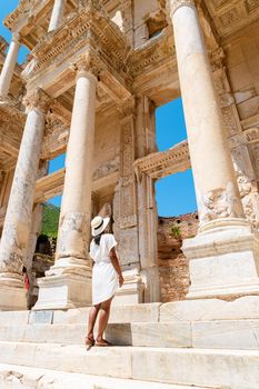 Ephesus ruins, Turkey, beautiful sunny day between the ruins of Ephesus Turkey. Asian women with a hat visit Ephesus