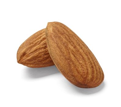 Close up of almonds on white background