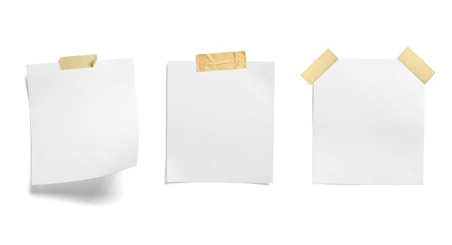 close up of a note paper with adhesive tape on white background