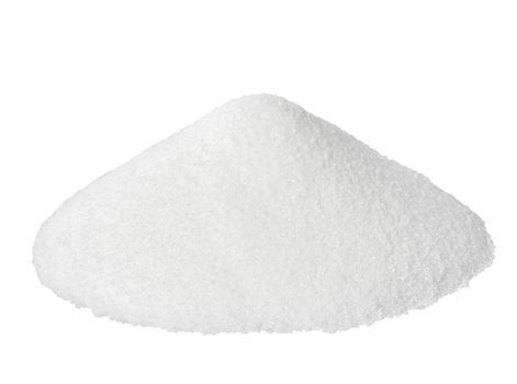 Close up of a pile of salt on white background