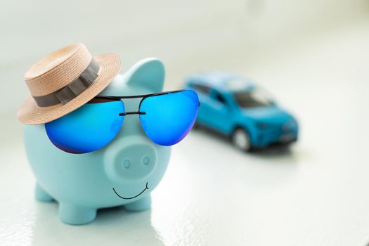 Piggy bank summer vacation, travel, retirement saving concept.