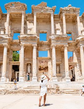 Ephesus ruins, Turkey, beautiful sunny day between the ruins of Ephesus Turkey. Asian women with a hat visit Ephesus