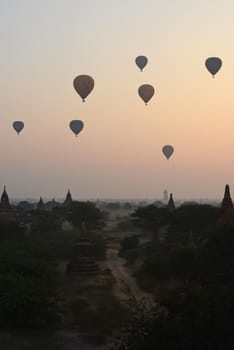 hot air balloon with pagoda in bagan