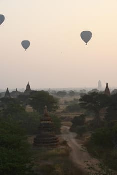 hot air balloon with pagoda in bagan