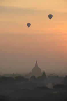 hot air balloon with pagoda in bagan