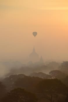 hot air balloon with pagoda in bagan