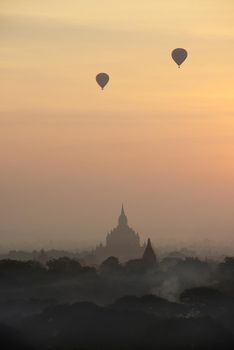 hot air balloon with pagoda in bagan