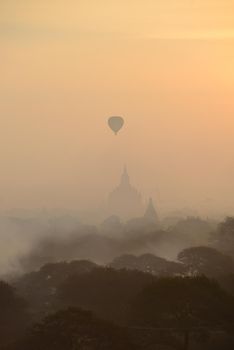 hot air balloon with pagoda in bagan