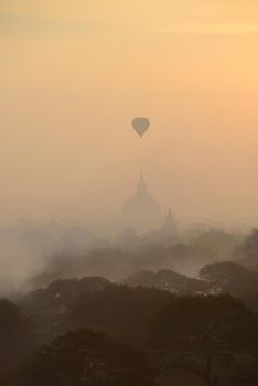 hot air balloon with pagoda in bagan