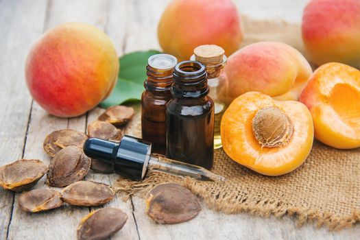 apricot oil in a small jar. selective focus. nature.