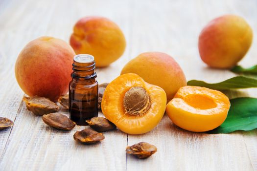 apricot oil in a small jar. selective focus. nature.