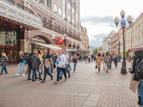 MOSCOW, RUSSIA - September 17, 2022. Local people and tourists walk on famous Arbat street.