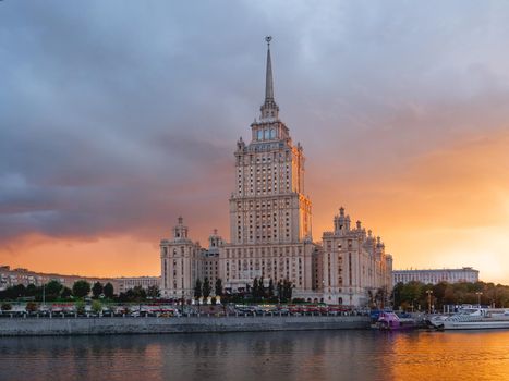 MOSCOW, RUSSIA - September 17, 2022. Hotel Ukraine at sunset, famous skyscraper on Moscow-river embankment.