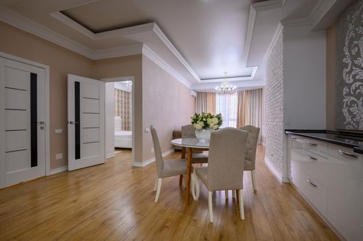Luxury white and pink modern studio apartment interior with dining area, living area and bedroom