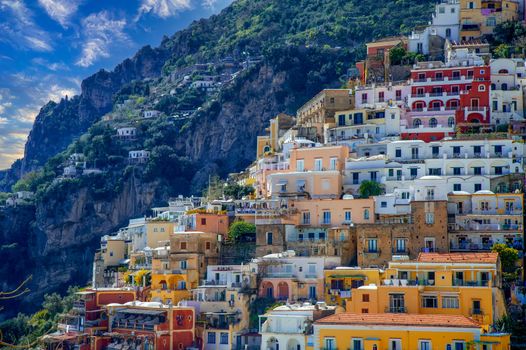 Amalfi Coast Italy photographed from the ferryboat on a sunny day with colourful houses visible on the coast 2022 april 15