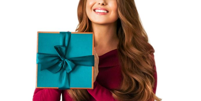 Birthday, Christmas or holiday present, happy woman holding a green gift or luxury beauty box subscription delivery isolated on white background, portrait