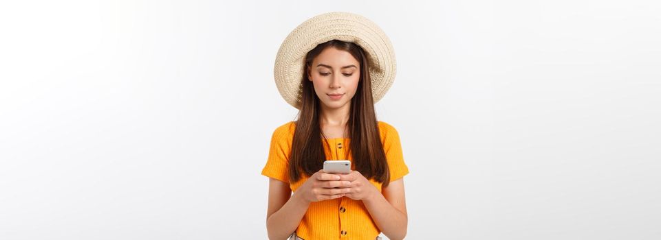 Woman sending a sms on cell phone, isolated on white background.