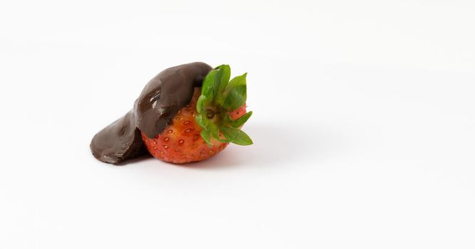 strawberries with chocolate on white background